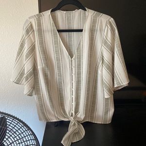 Grey and white stripped blouse.